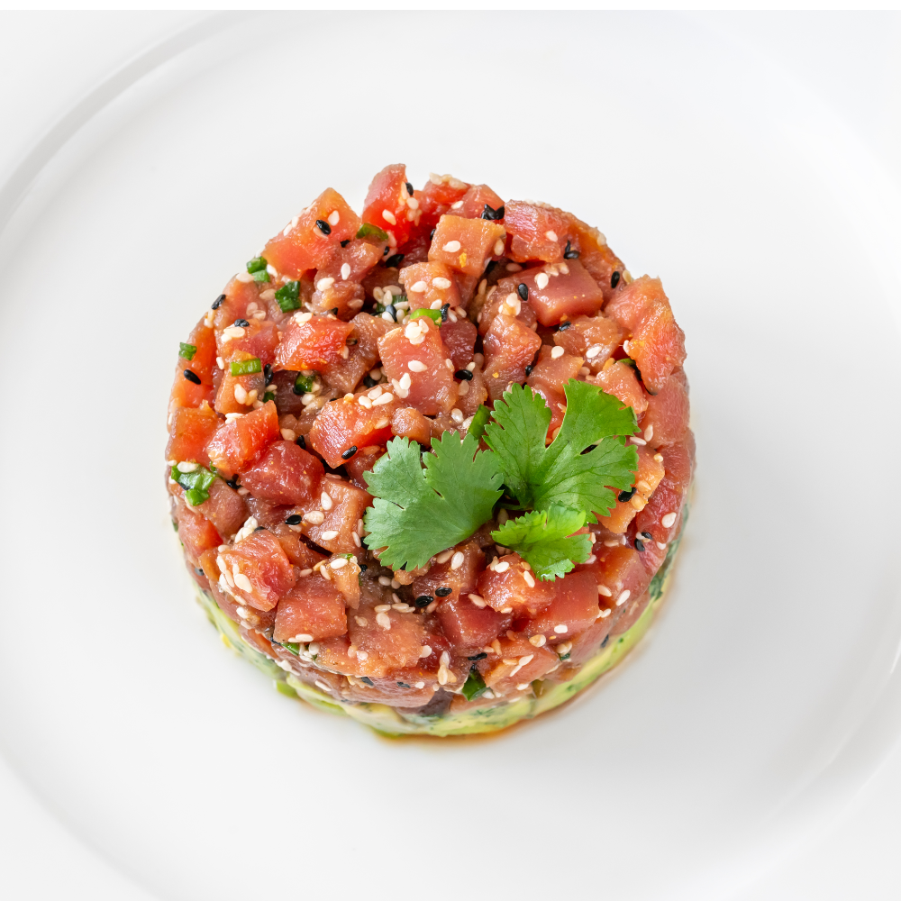 fish tartare on a wite plate