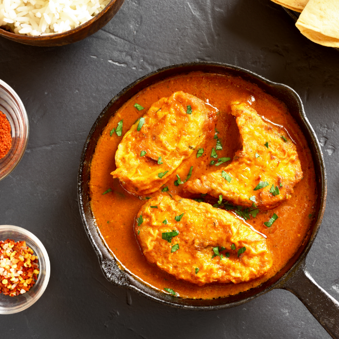 kingfish curry in a pan